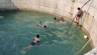 Village boys swimming in summer
