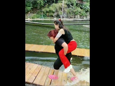 My daughter is so thoughtful to carry her mother across the river on her back. Even if you fell int