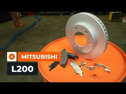 How to change the front brake discs and pads on MITSUBISHI L200 KA [AUTODOC TUTORIAL]