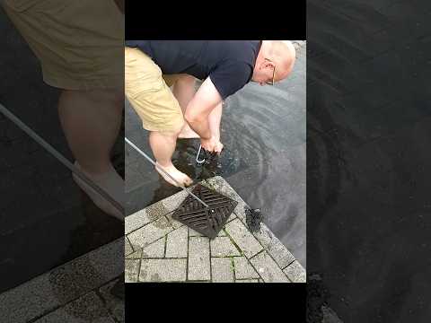 S#048-2  Unclogging a storm drain after rain in Germany, #shorts