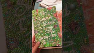 Finally finished bedazzling the series I’m inlove with the results💚🧡💜 #tsitp #books #teamconnie ￼