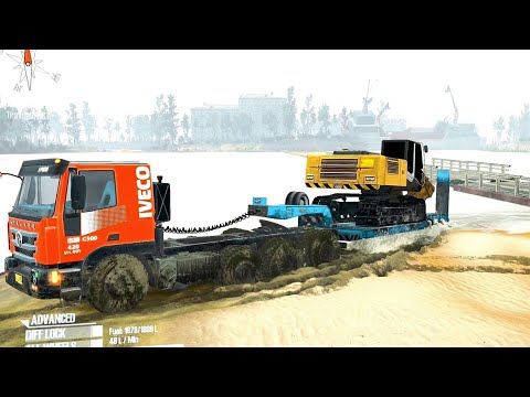 Spintires: Mudrunner .A truck carrying an excavator on the waterway. It is very strong.ep19