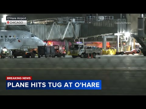 American Airlines plane strikes United tug at O'Hare, driver critically injured, officials say