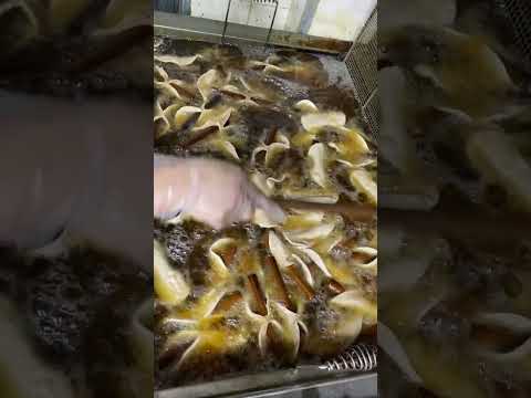 Here's how they make up to 8,000 homemade #cannolis daily at Fortunato Brothers. #italian #pastries