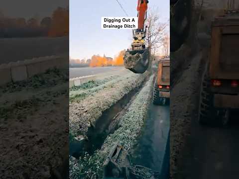 Digging Out A Drainage Ditch