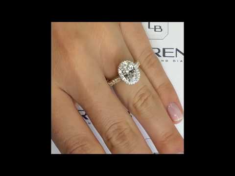 1.5 ct Oval Diamond Two-Tone Halo & 3 Row Band