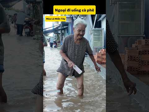 Thương Ngoại lội nước đi Uống cà phê kỷ niệm mùa nước lũ miền tây