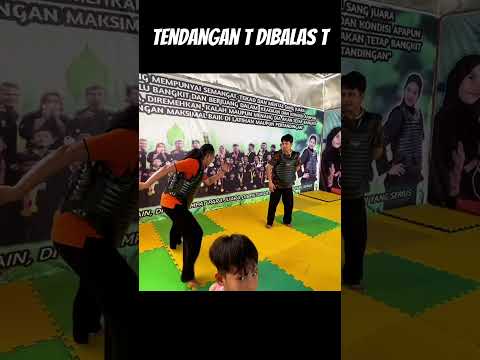 Tendangan T dibalas T