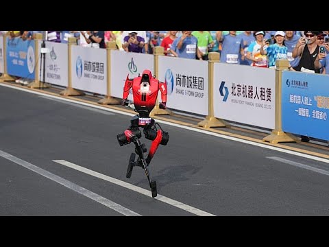 YouTube video thumbnail: Humanoid Robot Smashes Human Half-Marathon World Record in Beijing Race