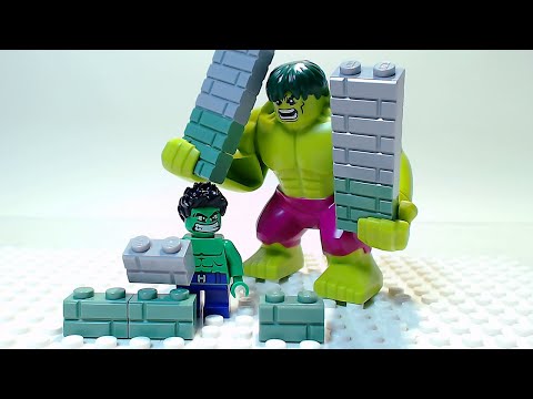 Green Big Guy and Small  Fella Building a Simple House