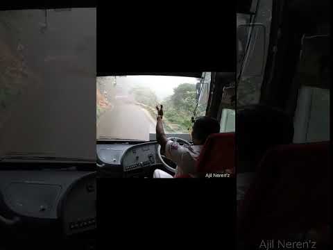 Ghat Riding Volvo Bus And Regular Bus Drivers Communicating with Air Horns on a Foggy Day.