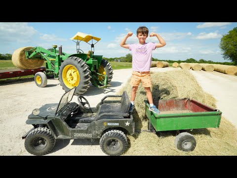 Hudson Drives a Real Tractor to Move Hay | Tractors for kids