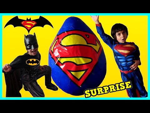 Kids open GIANT SURPRISE EGG and Pretend Play as Superman and Batman!!