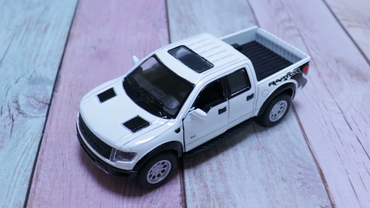 Автомобиль Ford F-150 Raptor SVT SuperCrew KINSMART металлический в ассортименте - видео