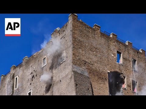 YouTube video thumbnail: Medieval Tower in Rome Partially Collapses, Leaving Worker Trapped