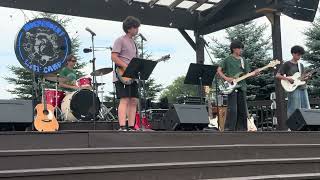 Liam rocks the drums on Everlong