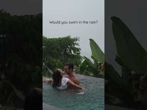 Couple Goals swimming in the rain in Bali 🇮🇩