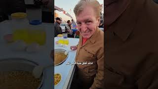 ترمب يبيع اللبلبي في شوارع بغداد! .. تعرف على أبو هبة شبيه الرئيس الأميركي