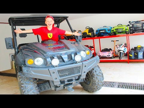 Little driver Ali rides on cars - Huge Toy Car Garage