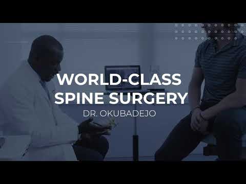 Doctor consulting patient about spine surgery options.