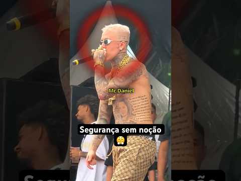 Mc Daniel BRIGA com um segurança..