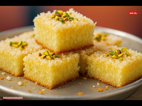 كيكة جوز الهند الخفيفة: لذة بدون دقيق أو زبدة! 🍰 وصفة بسيطة ولذيذة في كل الأوقات