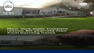 New York state troopers rescue 80-year-old man from burning home