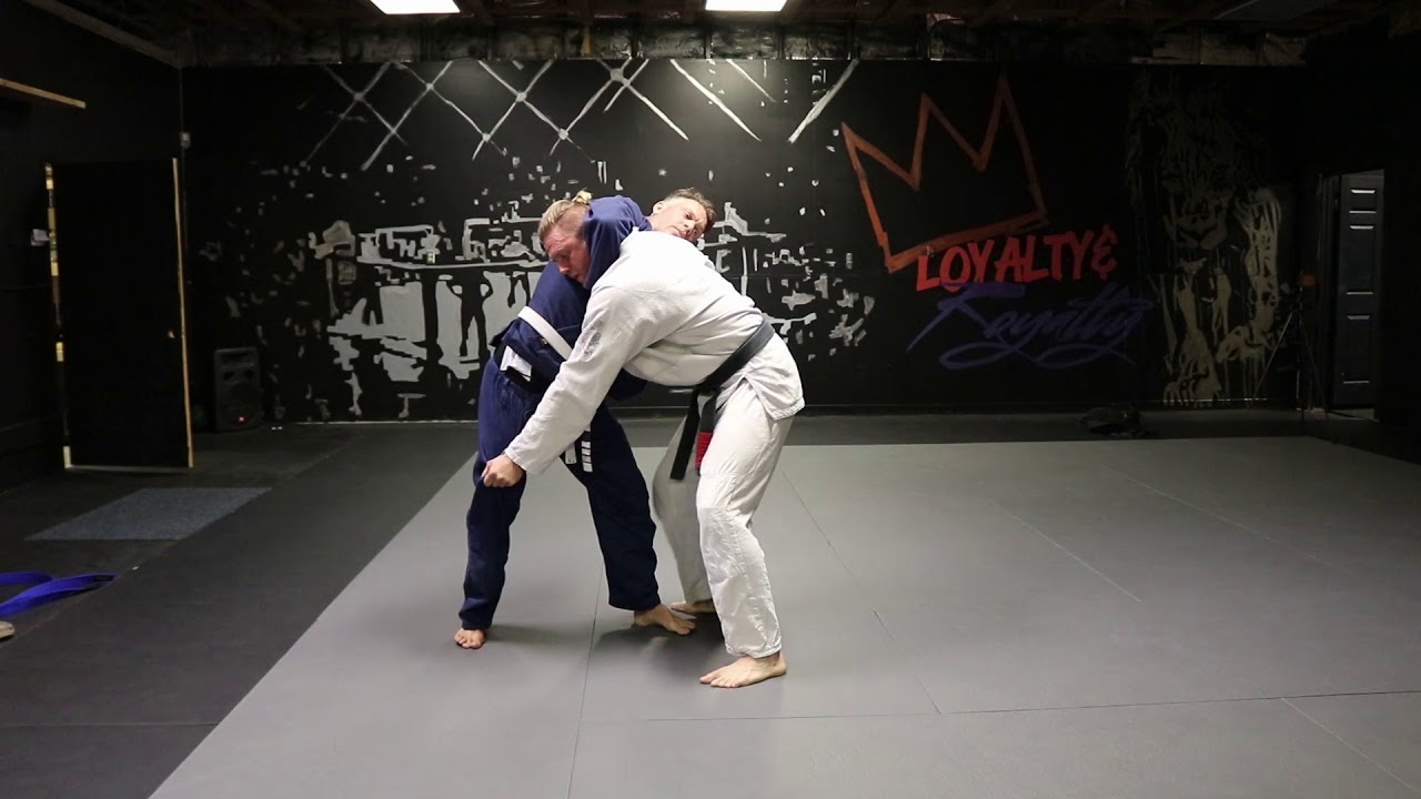 Guillotine defense (with trip takedown)