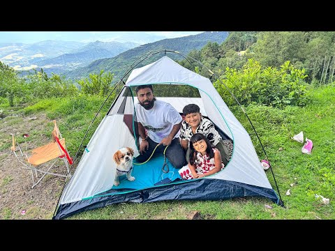 Camping on mountain with family