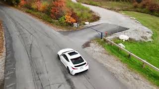 DJI mini4 drone follow Lexus RCF