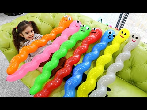 Emily Playing with Spiral Balloons