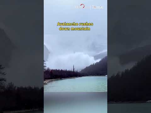 Avalanche rushes down mountain