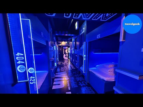 Trying $14 Capsule Hotel in Osaka Japan like TRON | Esports Hotel e-ZONe