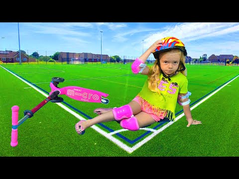 Anabella learn rules how to ride safety on scooter