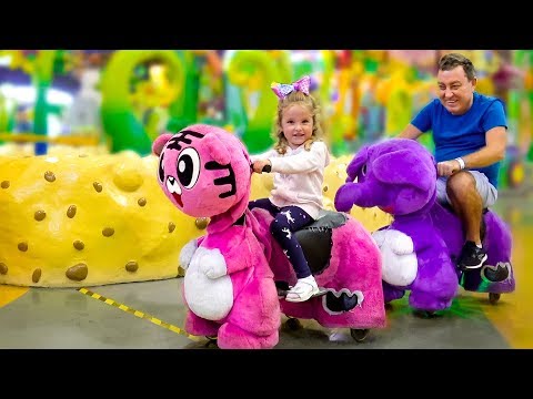 Milusik and papa plays at the amusement park