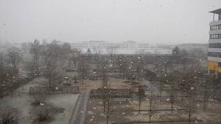 Schneefall mit Radlader am 26. März 2026 in München