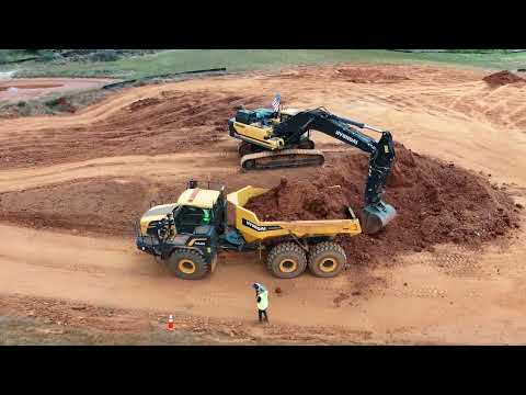 Excavator competition, truck pull, vacation.