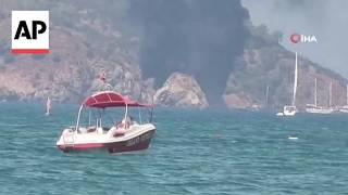 YouTube video thumbnail: Tourist Boat Catches Fire off Turkey, More Than 100 Passengers Rescued