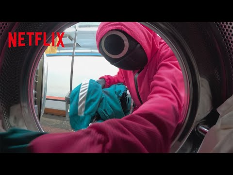 SquidGamePinkGuardsSpottedAtALocalLaundromatNetflix