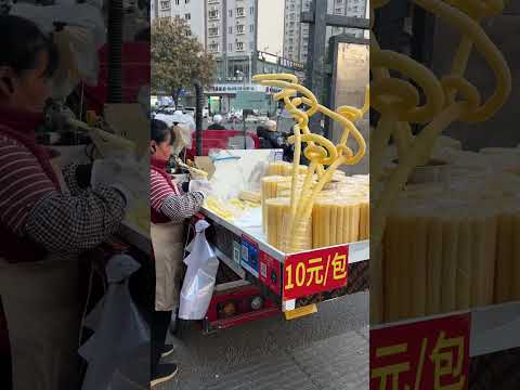 Traditional corn snacks being made in #China -- these are #deliciois! #travel #exploring #food