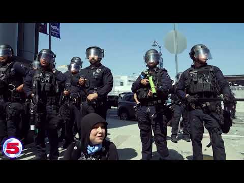 Protestors Attack Cops with Silly String
