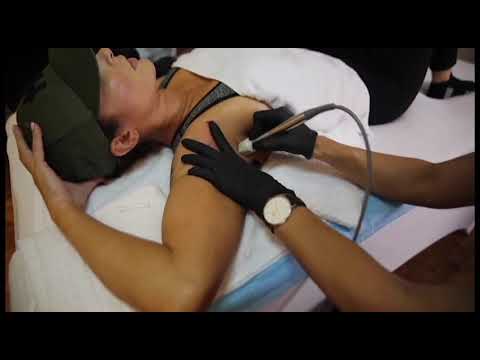 Woman receiving a beauty treatment in a clinic.