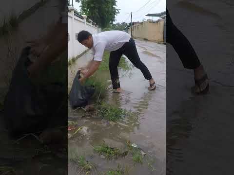 Full Clog By Weed And Plastic #culvert #unclog #drain #shorts