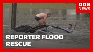 YouTube video thumbnail: Australian Reporter Swims Through Flood to Rescue man From Sinking car