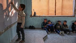 YouTube video thumbnail: Nearly Two Years After the Fall of Assad, Syrian Children Return to School Amid Ruins