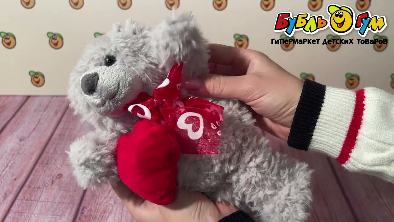 Игрушка мягкая Мишка серый с красным бантиком и сердцем 15см - видео