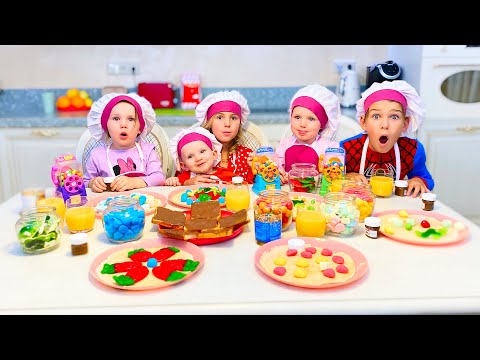 Cinq Enfants jouent préparent le petit déjeuner pour maman
