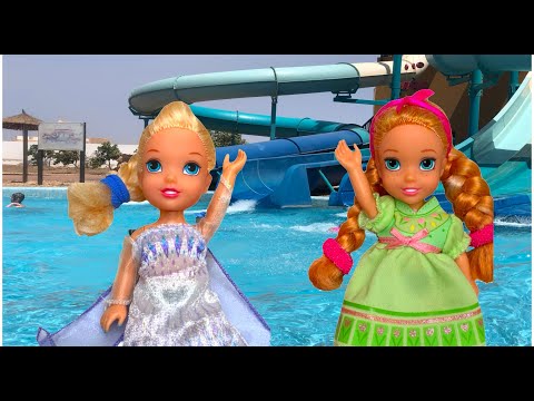 Elsa and Anna toddlers swimming pool videos