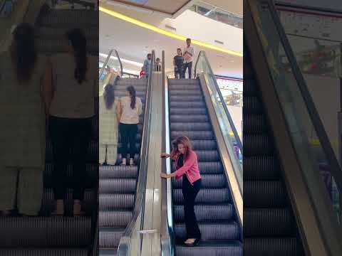 Bag snatching prank ? in Escalator #shorts #shortsfeed #funnyprank #funny #viral #escalatorprank
