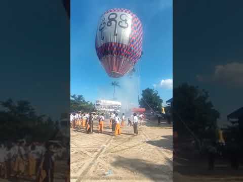 Hot air balloon flies in the sky during Myanmar's famous festival